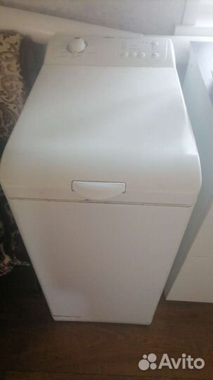 Стиральная машина с вертикальной загрузкой