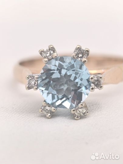 Золотое кольцо с топазом и брилл 585/4.06/19