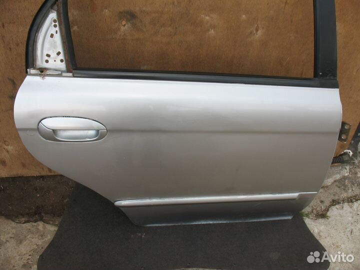 Правая задняя дверь Kia Shuma 2/Spectra