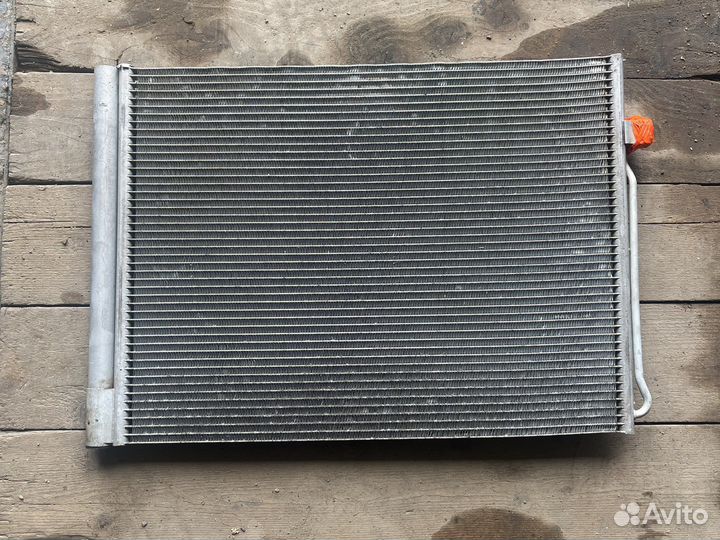 Радиатор кондиционера e70