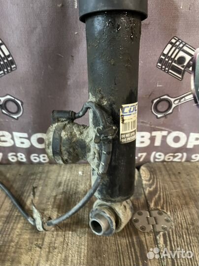 Kia quoris 3.8 амортизатор задний левый