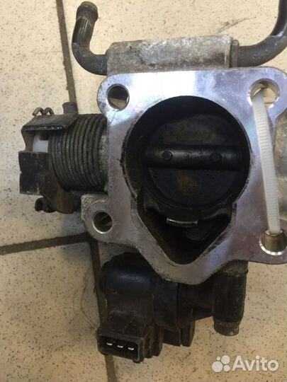 Дросельная заслонка Kia Picanto 1