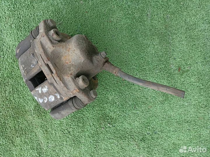 Тормозной суппорт передний левый Renault Logan