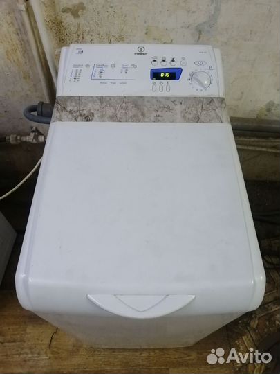 Стиральная машина с вертикальной загрузкой