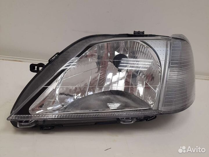 Фара левая Renault Logan 1