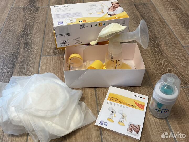 Молокоотсос medela ручной с бутылочкой