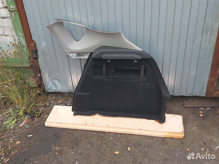 Обшивка багажника Opel Astra J