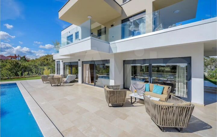 Коттедж 178,6 м² на участке 5 сот.