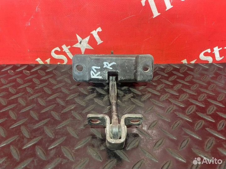 Ограничитель двери правой Renault T