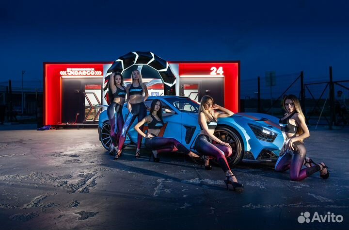 Сотрудник шиномонтажа