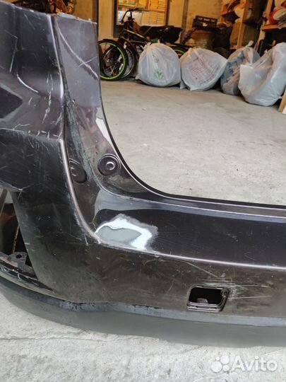 Задний бампер Subaru Outback 4 B14 57704AJ020