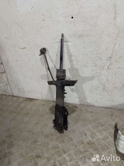 Стойка амортизатора передний левый Kia Cerato 4