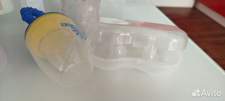 Детские бутылочки и молокоотсос