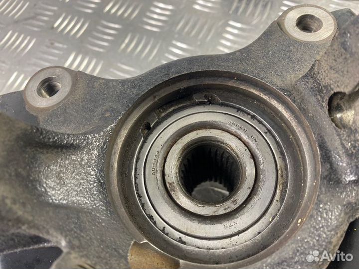 Кулак поворотный передний левый Mitsubishi Lancer