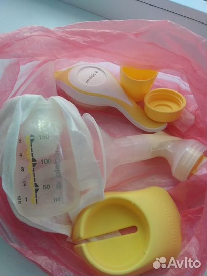 Молокоотсос medela