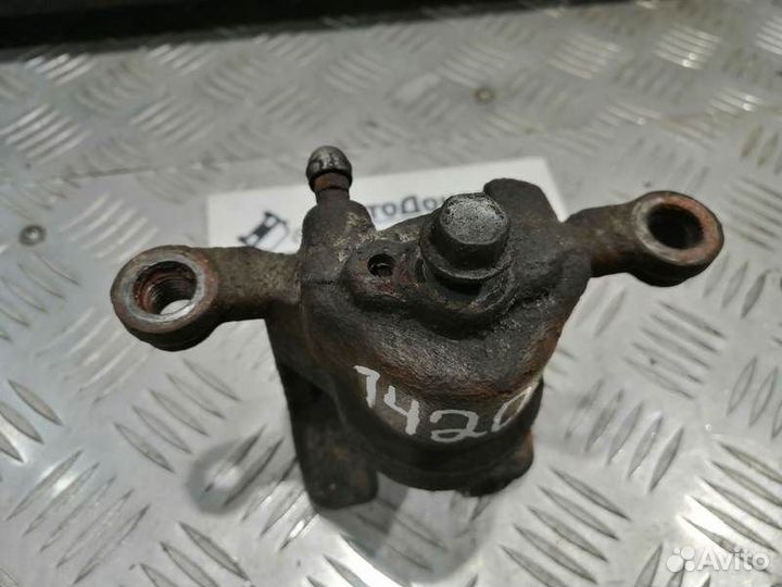 Суппорт тормозной задний левый Nissan Teana J31