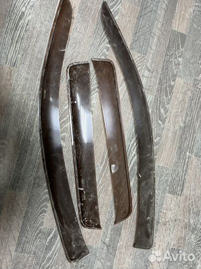 Ветровики mazda demio