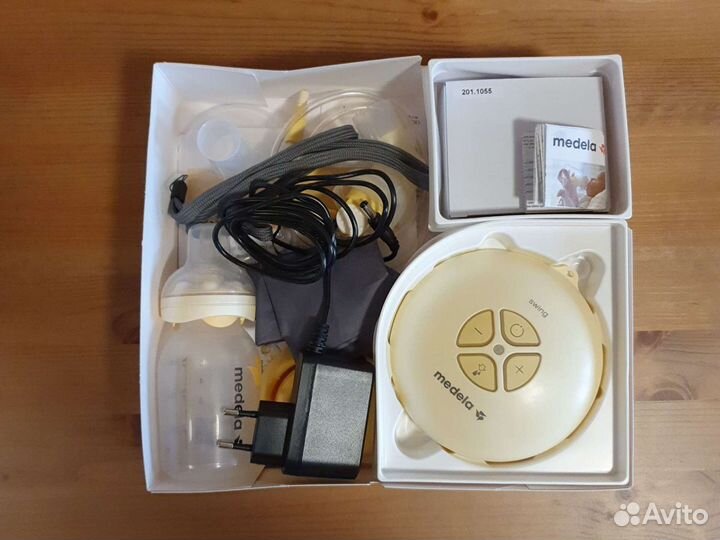 Молокоотсос medela swing