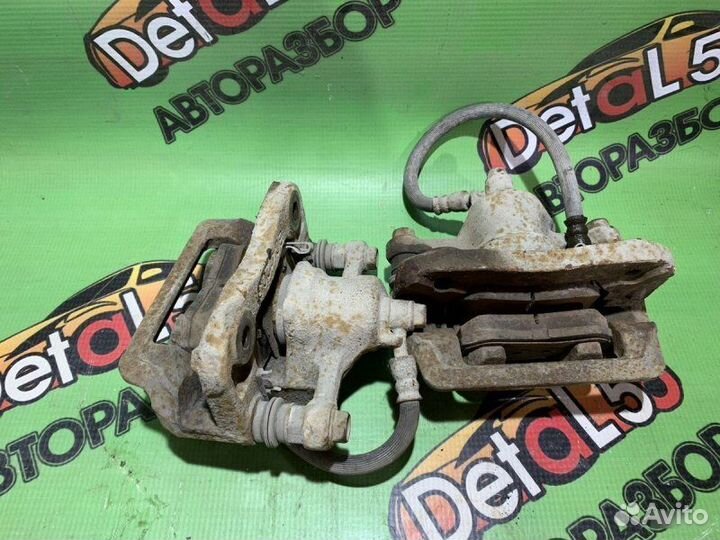 Суппорт тормозной задний Hyundai Elantra (Hd) Iv