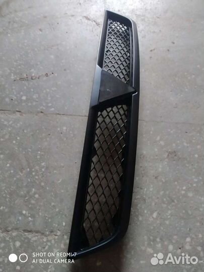 Решётка радиатора Митсубиси Лансер X