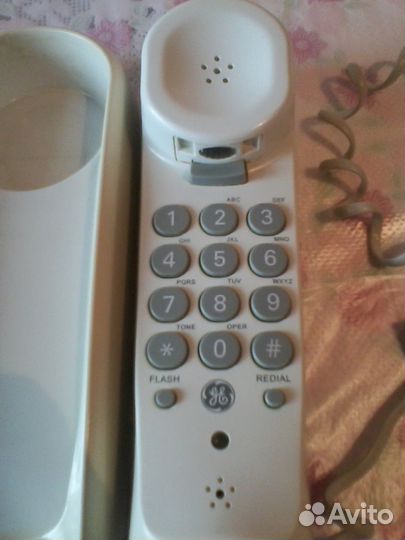 Настенный телефон