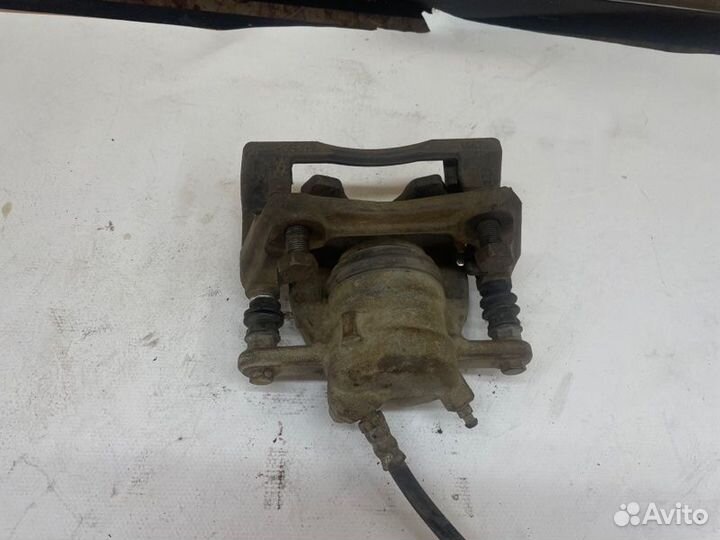 Суппорт тормозной передний левый Лада Largus R90