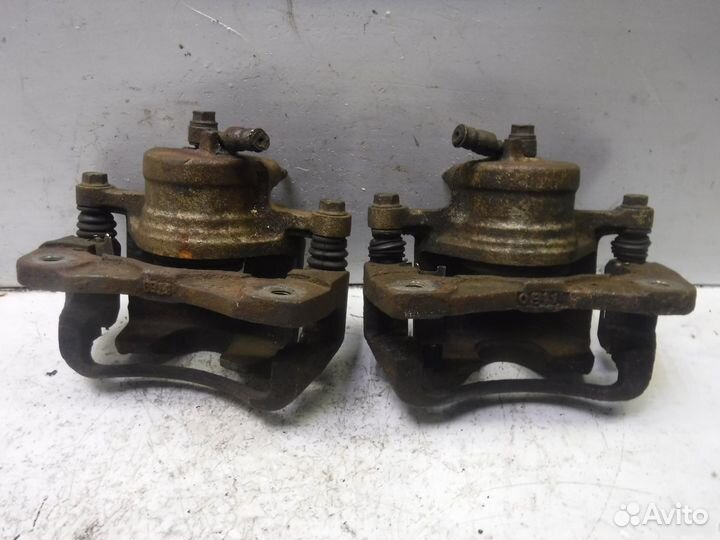 Суппорт тормозной передний Daewoo Nubira