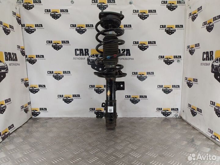 Стойка амортизатора передняя правая R Mazda 6