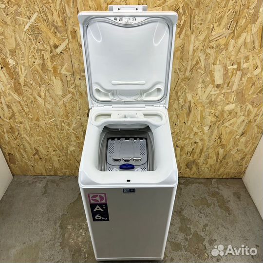 Стиральная машина с вертикальной загрузкой 6