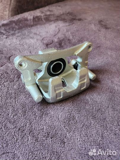 Суппорт задний левый Mitsubishi Outlander XL