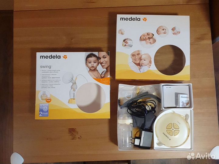 Молокоотсос medela swing