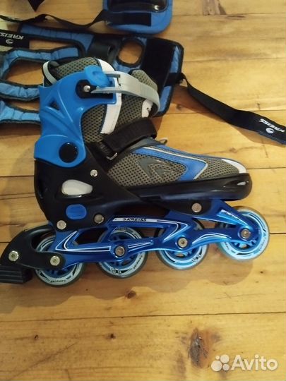 Роликовые коньки