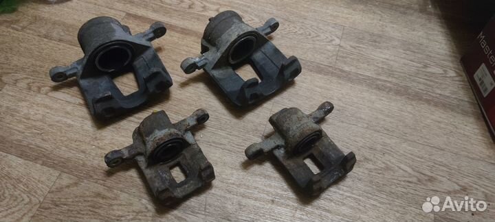 Суппорт тормозной Chevrolet Lacetti