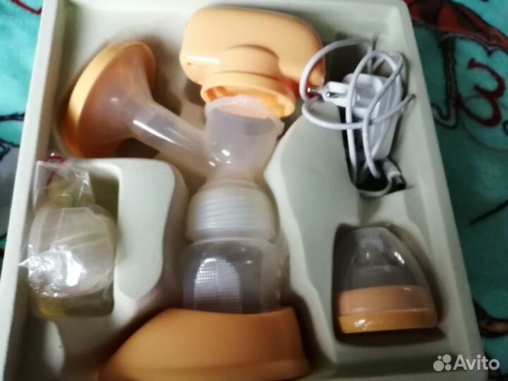 Молокоотсос электрический