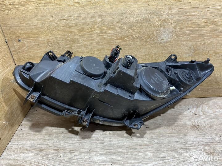 Фара передняя правая Peugeot 307 рест 142447