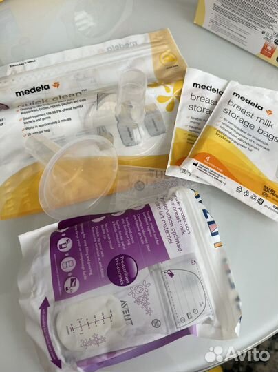 Молокоотсос medela электрический