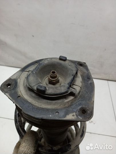 Nissan Qashqai (J10) I амортизатор передний левый