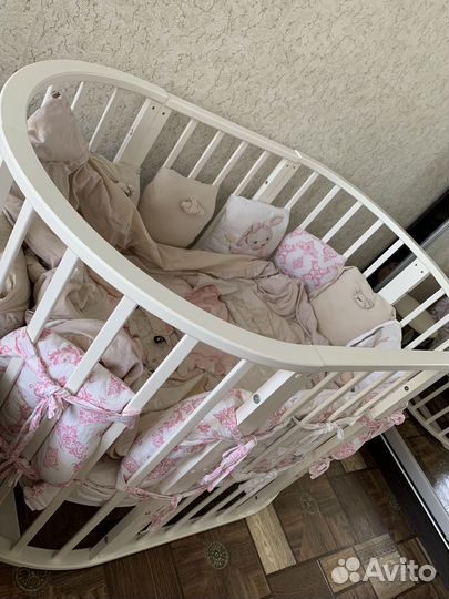 Детская кроватка-трансформер с маятником