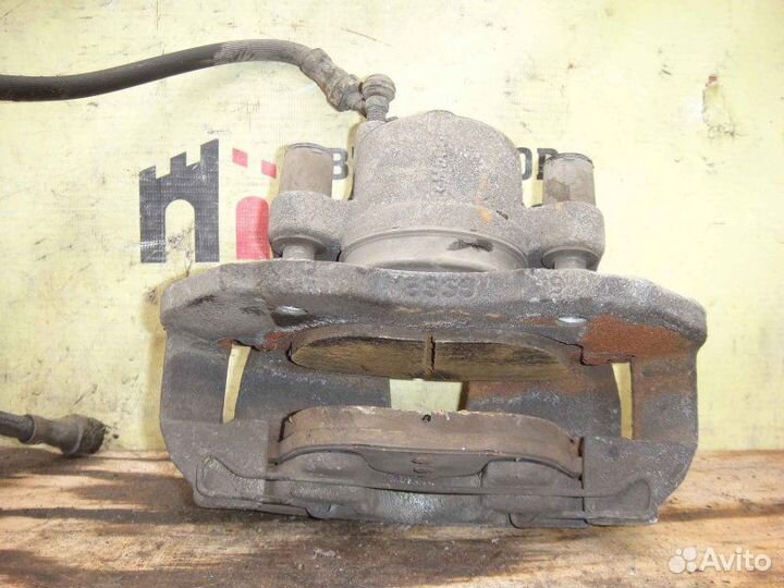 Суппорт тормозной передний левый Ford Ecosport