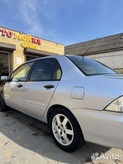 Mitsubishi Lancer 1.6 МТ, 2003, 124 525 км