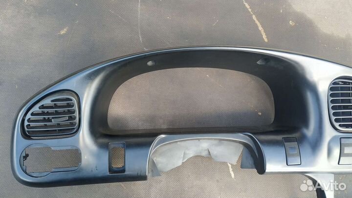 Центральная консоль торпеды Киа Спектра