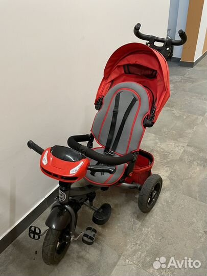 Трехколесный велосипед с ручкой