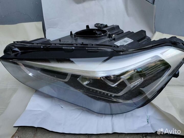 Фара левая BMW x1 код зч 63119477811