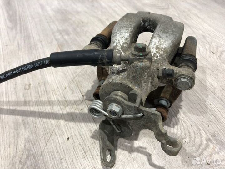 Суппорт тормозной задний правый Skoda Octavia A7