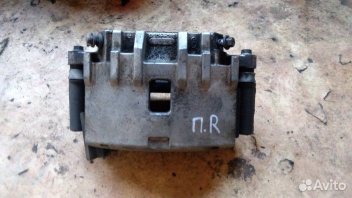 Суппорт тормозной передний правый Cadillac SRX 200