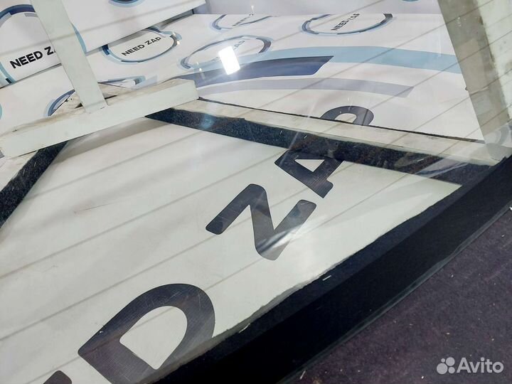 Стекло заднее Peugeot 301