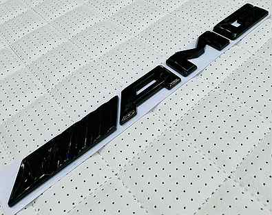 Логотип AMG чёрный глянец на багажник Mercedes