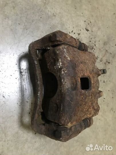 Суппорт тормозной передний левый Kia Soul 2.0 I