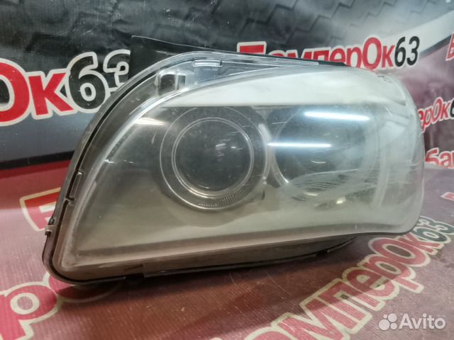 Фара левая BMW X1