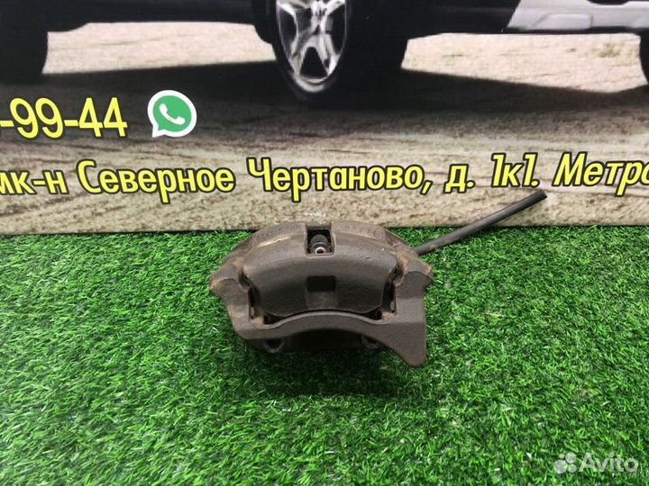 Суппорт тормозной передний левый Renault Sandero 1